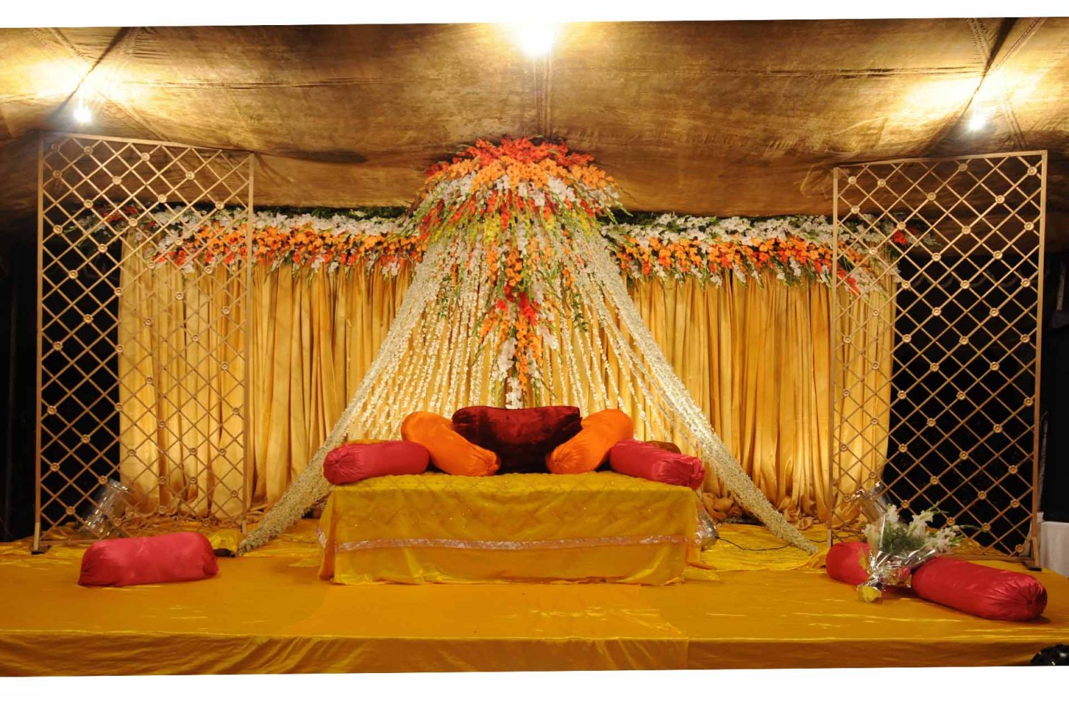 mehendi-ceremony-event-planning-mehendi-decor-colorful-pillow