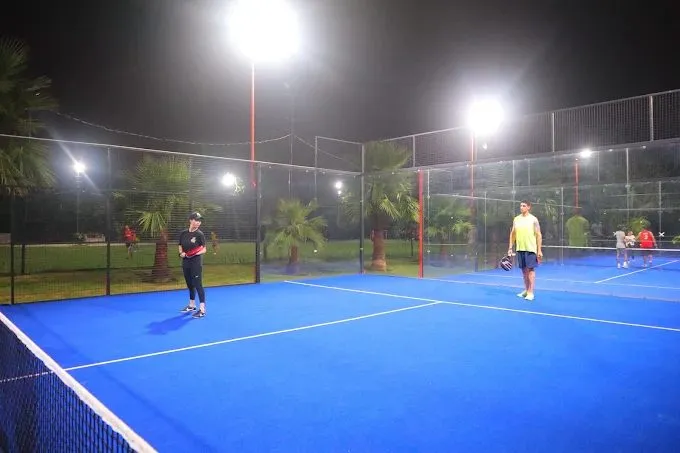 Friends enjoying a match at the ayub park Padel Courts.