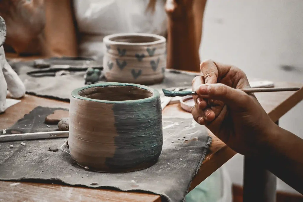 Beginner pottery teaching clay crafting techniques in Islamabad
